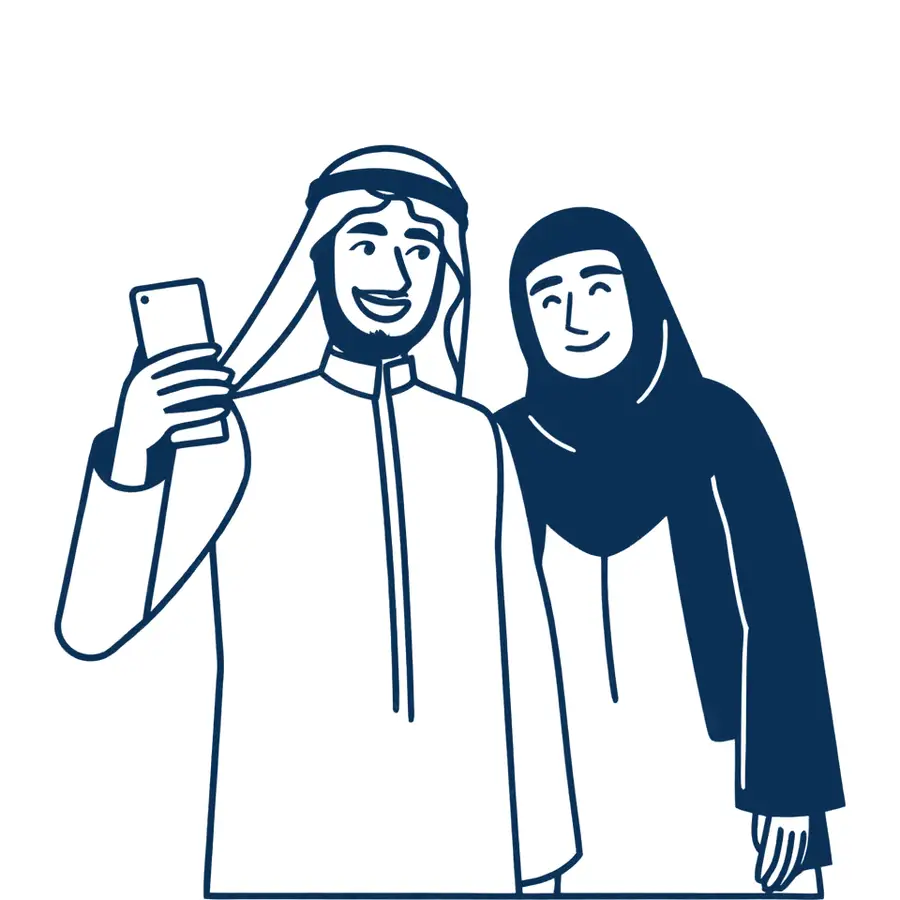 Two friends laughing as the man shows the woman something on his phone