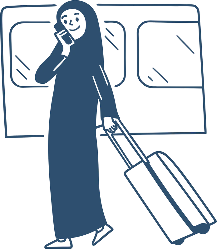 A woman walking through an airport with her suitcase